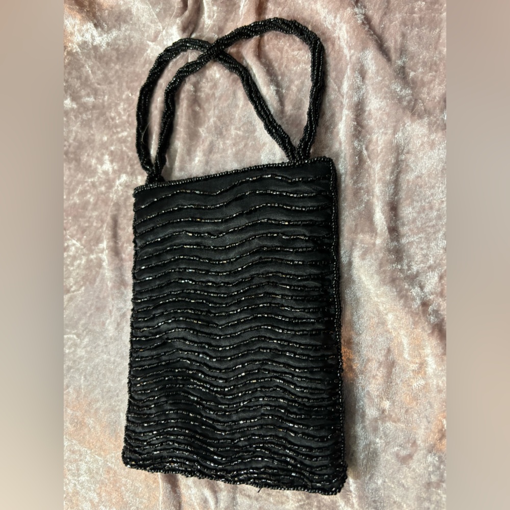 Small beaded sparkling wristlet purse